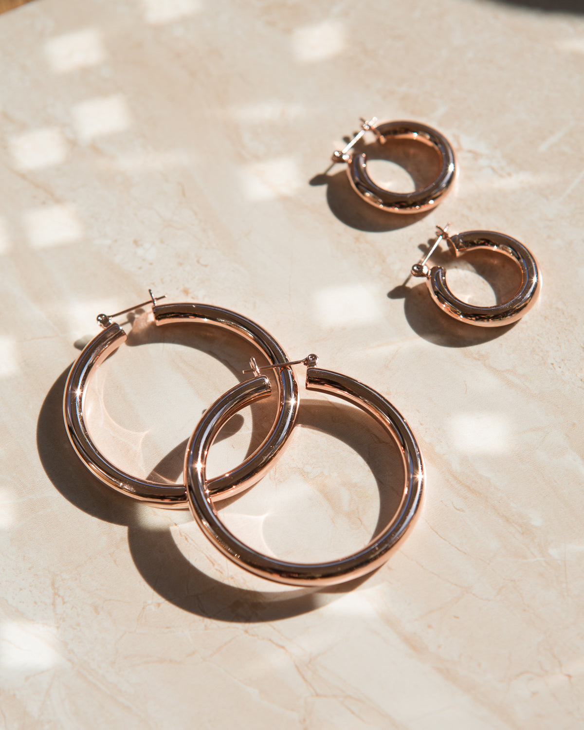 Amalfi Tube Hoops - Rose Gold — detail view