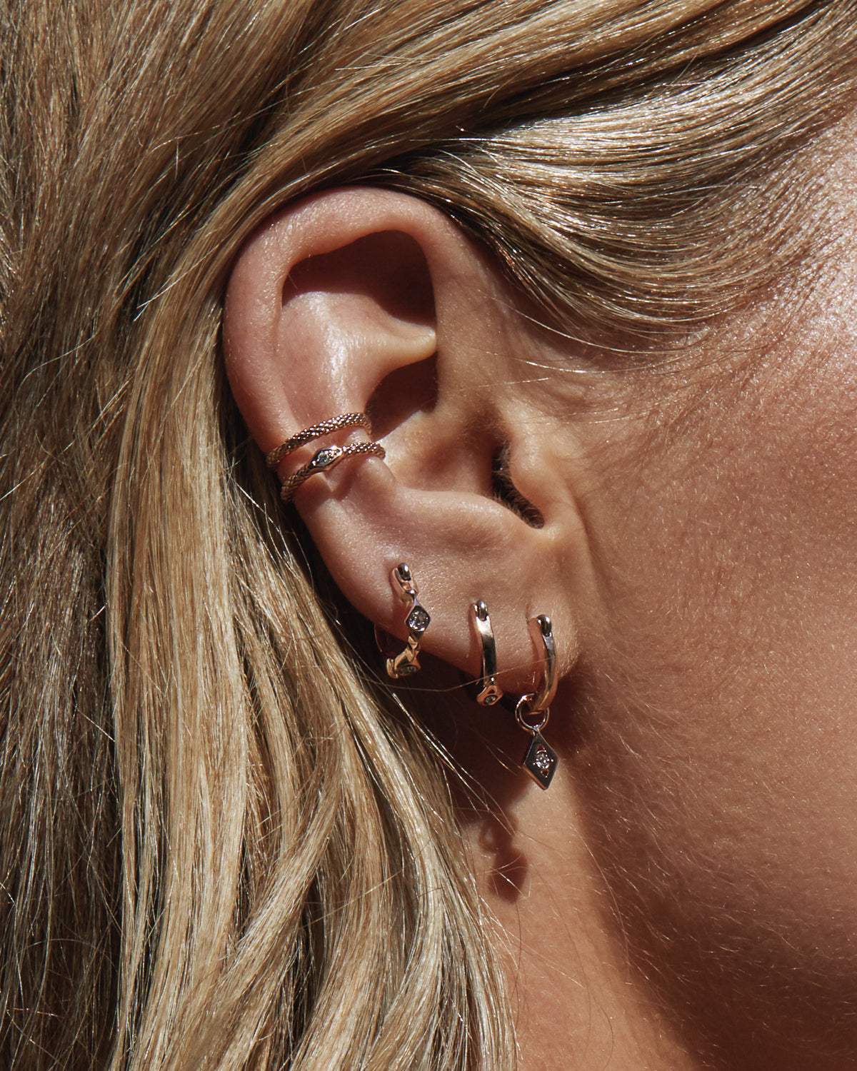 Evil Eye Hoop Huggies - Rose Gold — another angle