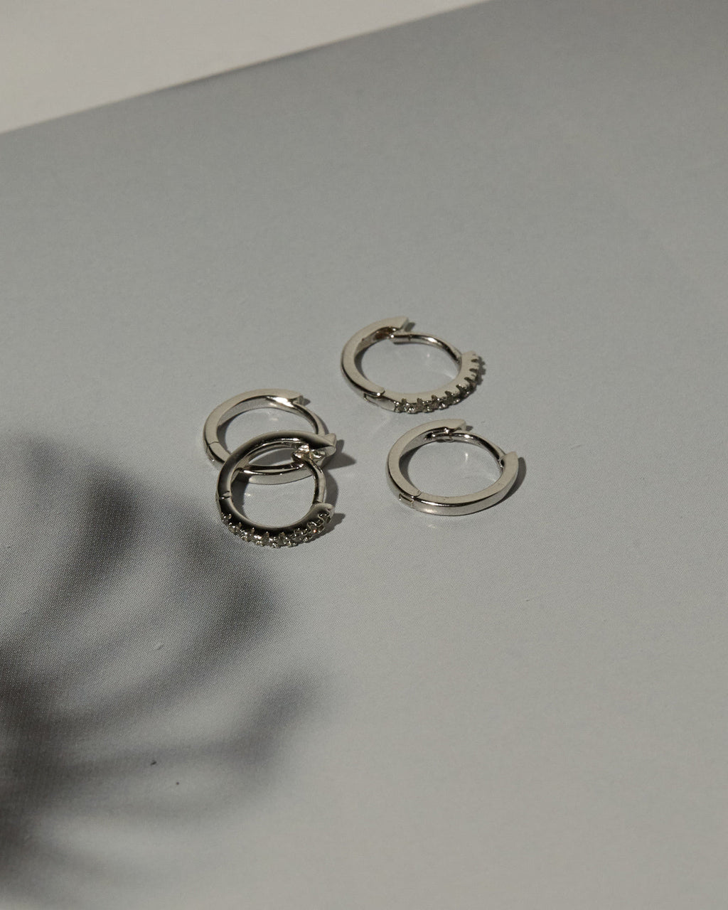 Sorrento Huggies - Silver - Earrings — another angle