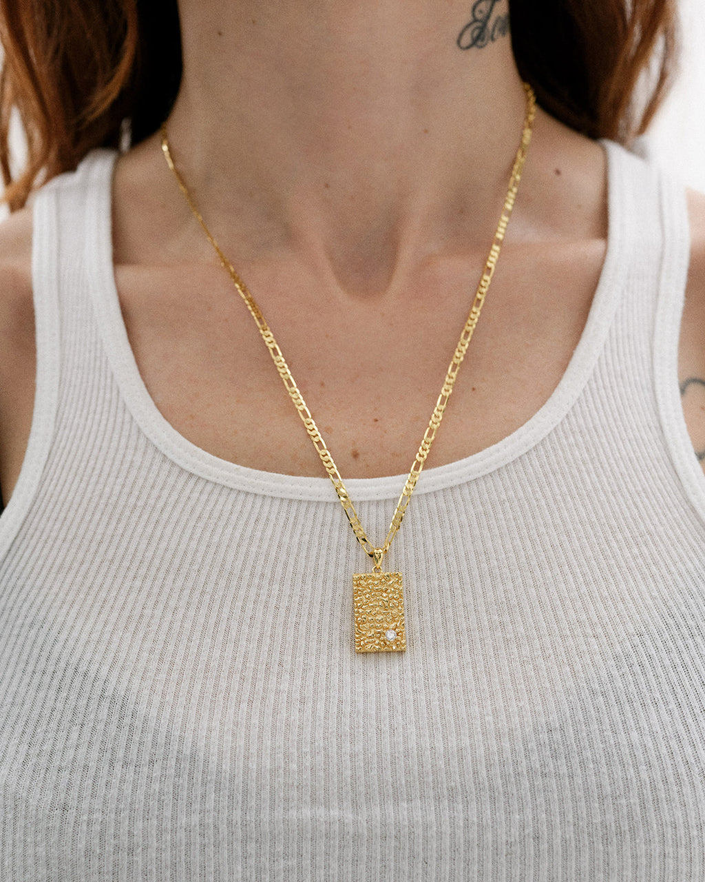 Tunie Tag Necklace in Gold — reverse view