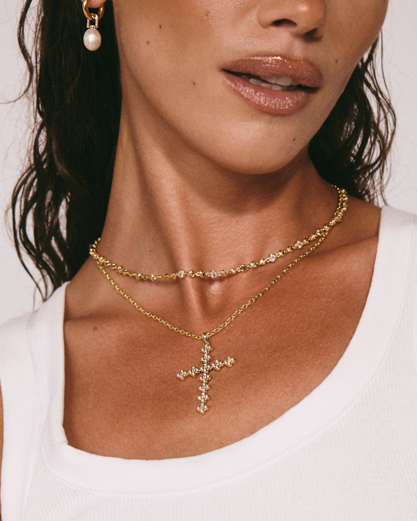 Daisy Stud Cross Necklace — detail view