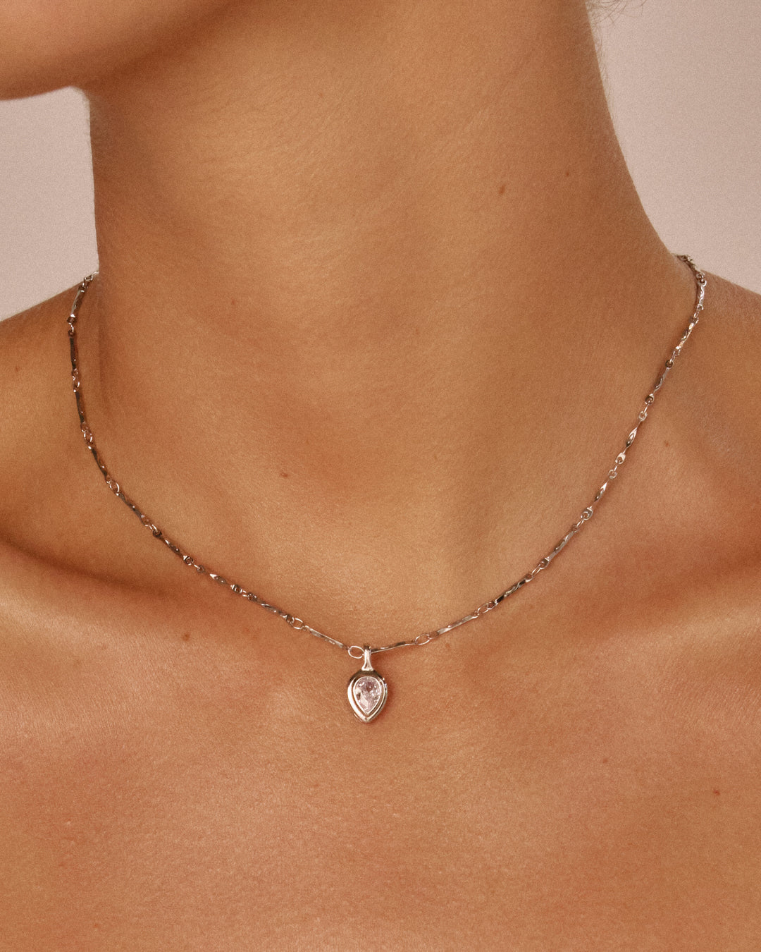 Pear Double Bezel Charm Necklace — another angle
