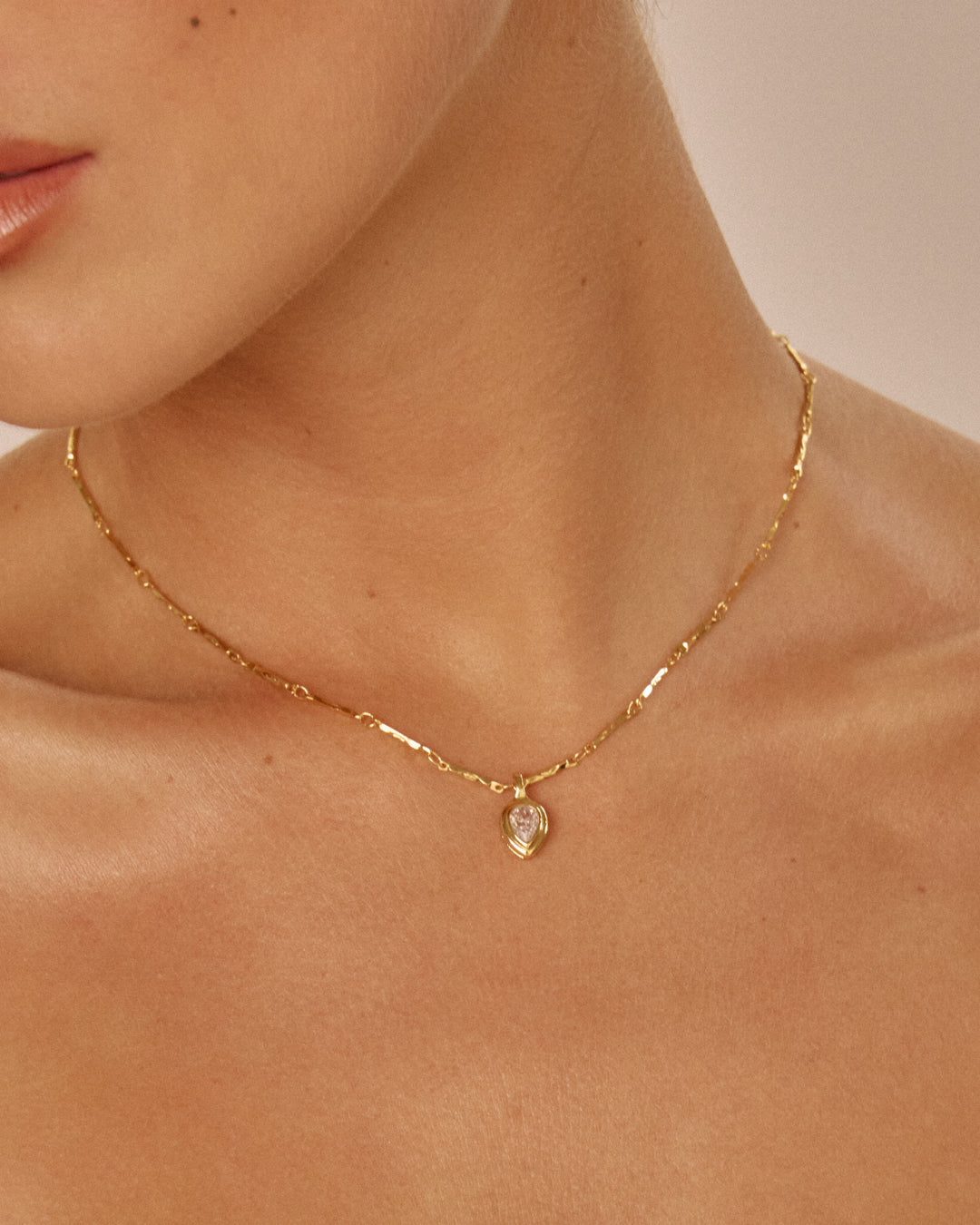 Pear Double Bezel Charm Necklace — detail view