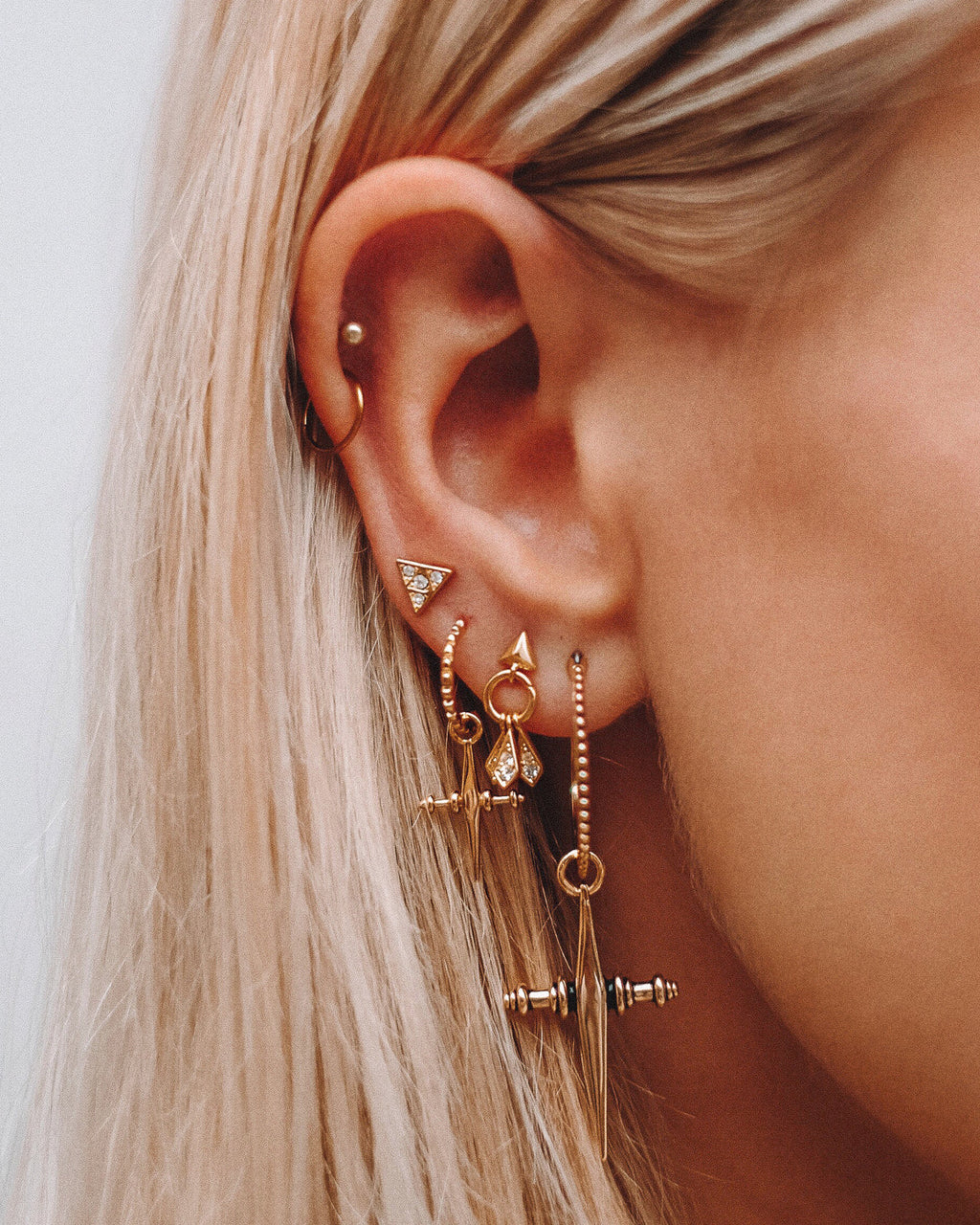 Cross Hoops - Gold in Antique Gold — detail view