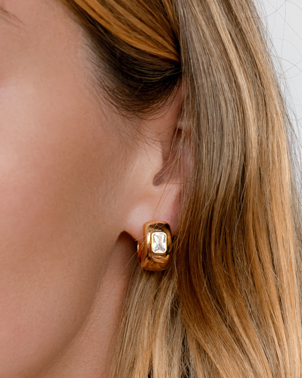 Emerald Bezel Stone Huggies in Gold - Earrings — alternate view 2