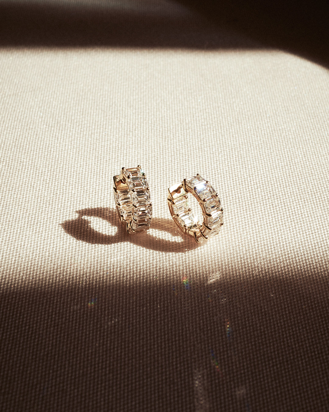 Emerald Prong Set Huggies - Earrings — detail view