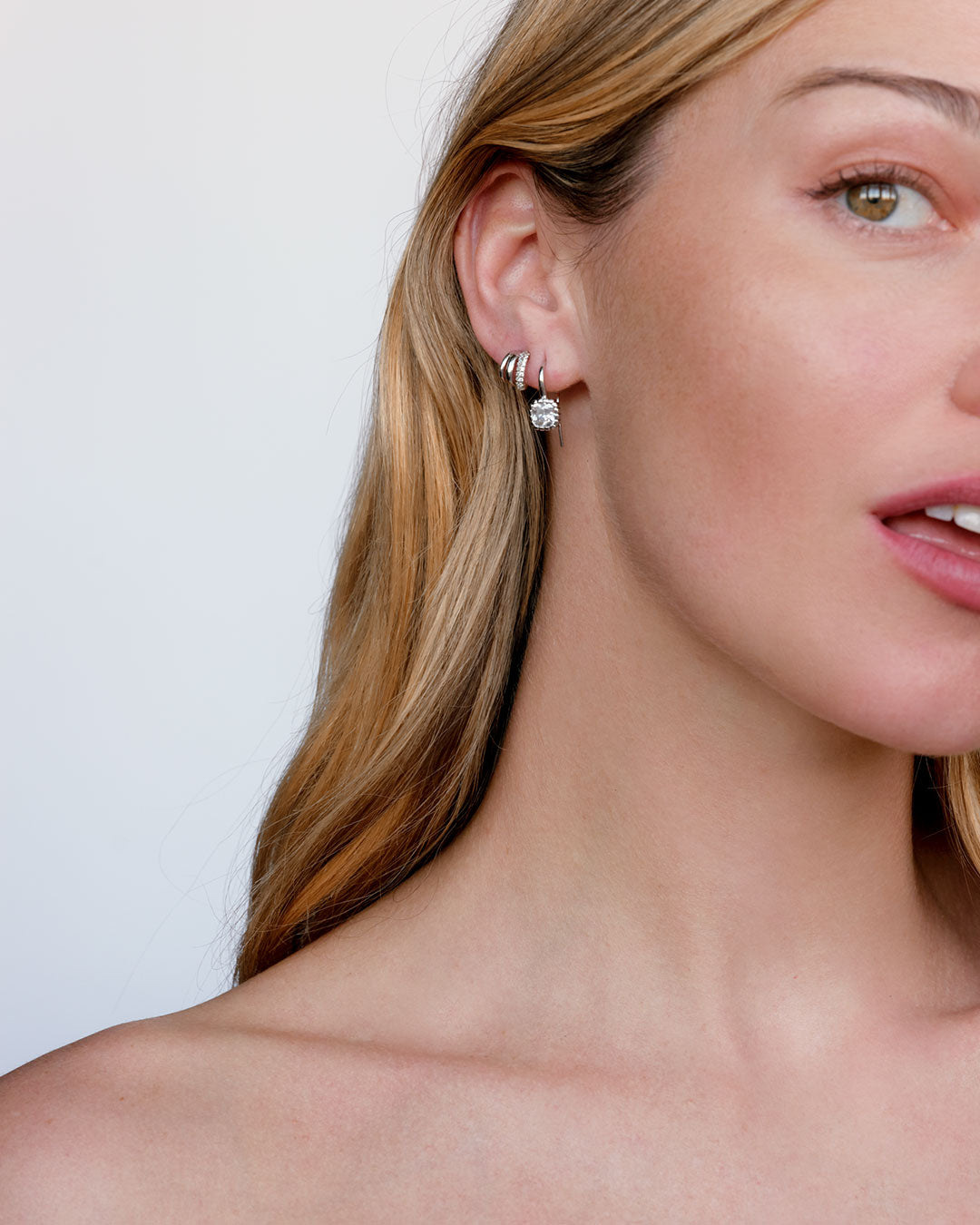 Multi Piercing Huggies (Gold Ships Mid September) in Silver - Hoops — another angle