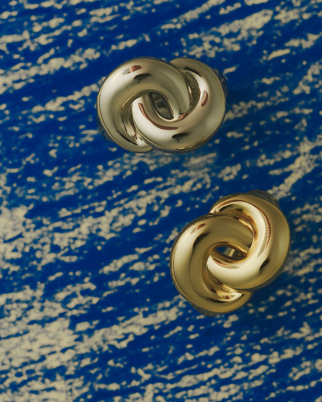 Solstice Knot Studs - Silver in Gold - Earrings — alternate angle