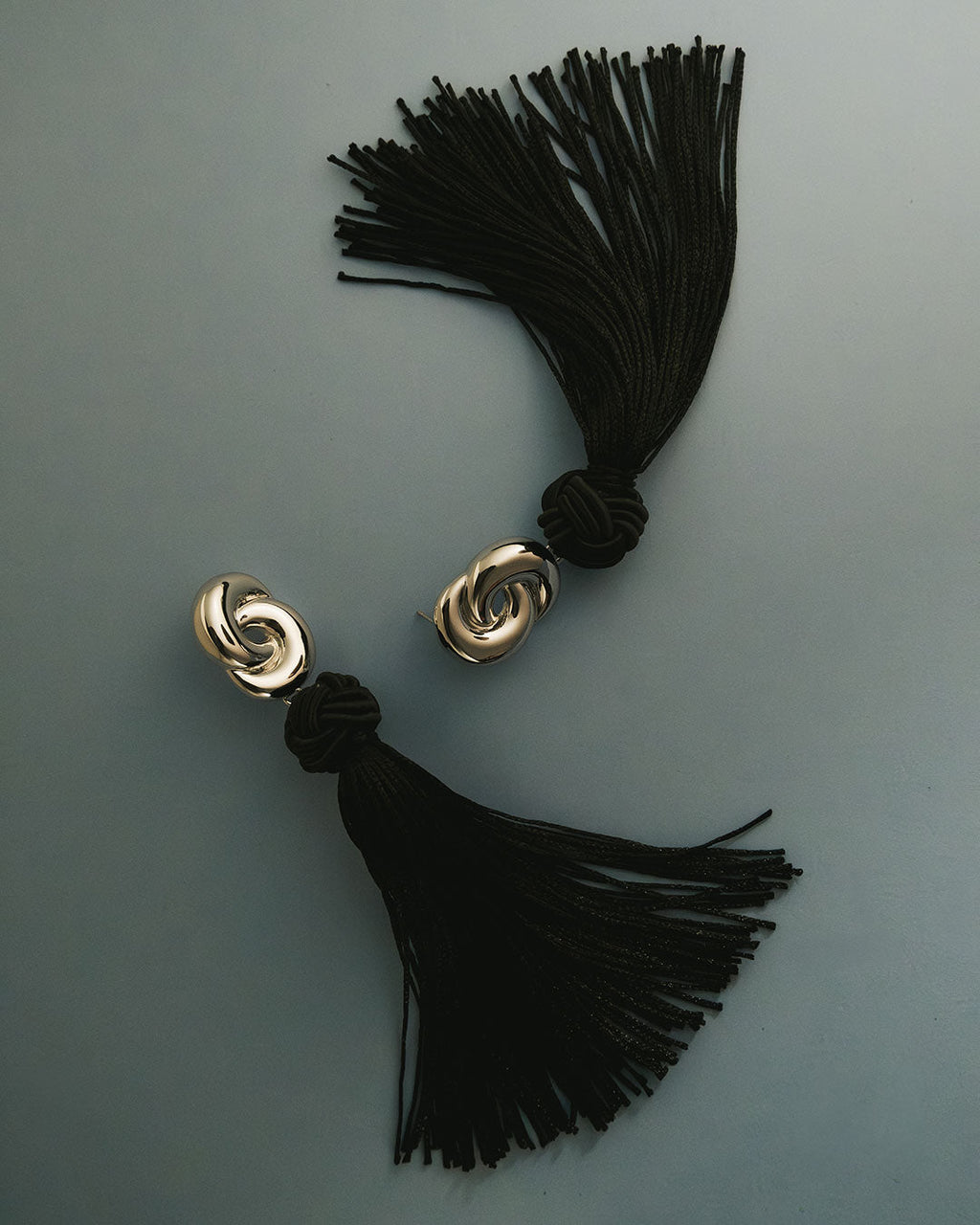 Solstice Knot Tassel Earrings - Silver in Gold — alternate view