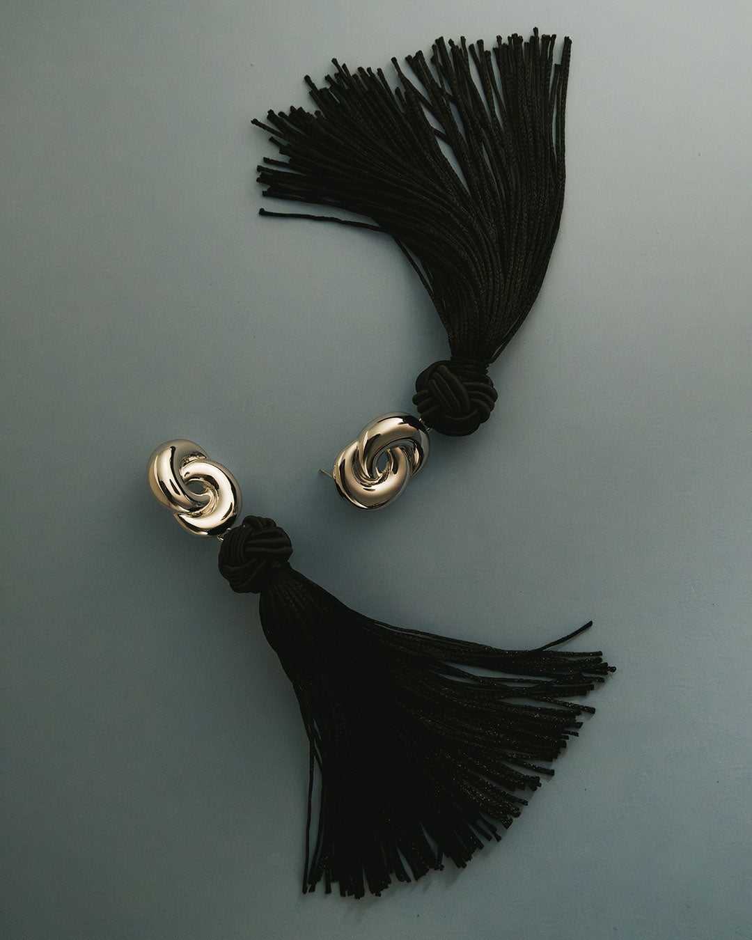 Solstice Knot Tassel Earrings - Silver in Gold — alternate view