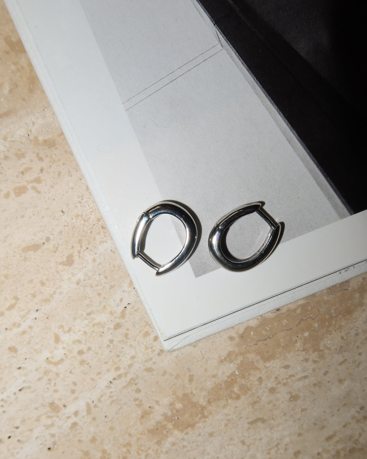 Mini Carmella Huggies (15mm) - Silver - Earrings — detail view