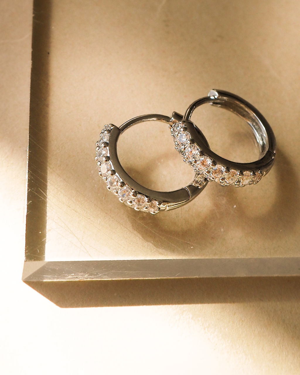 Baby Pave Huggies & Pave Interlock Hoops - Silver — another angle
