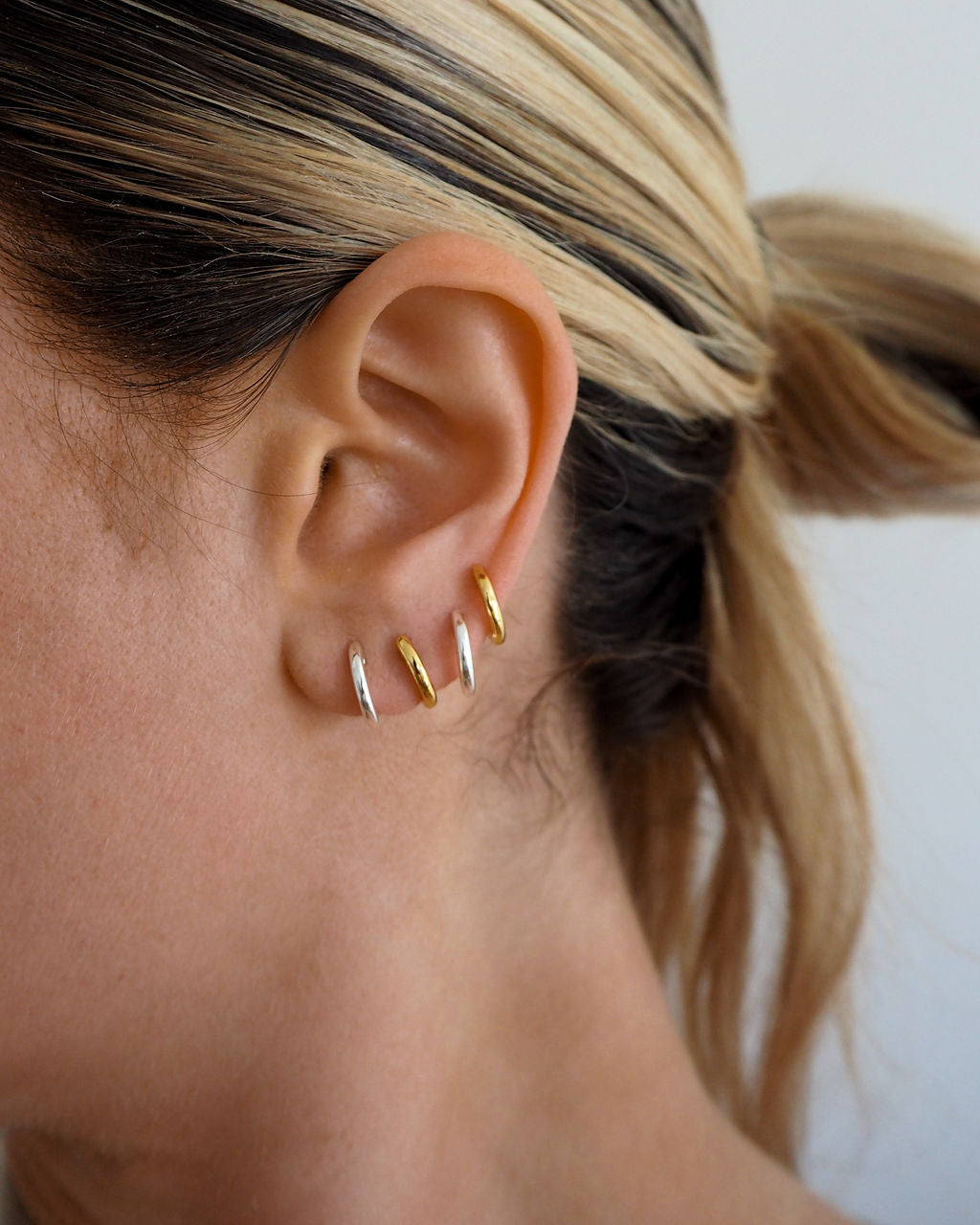 Sicily Huggies - Silver - Earrings — alternate angle
