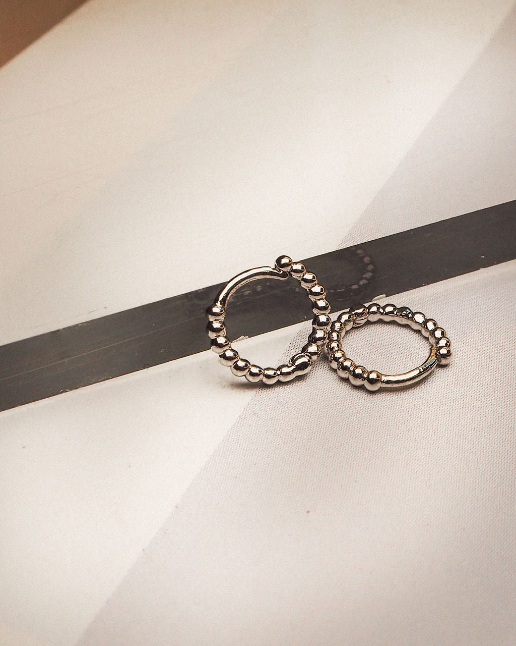 Mini Continuous Beaded Huggies - Silver - Earrings — detail view