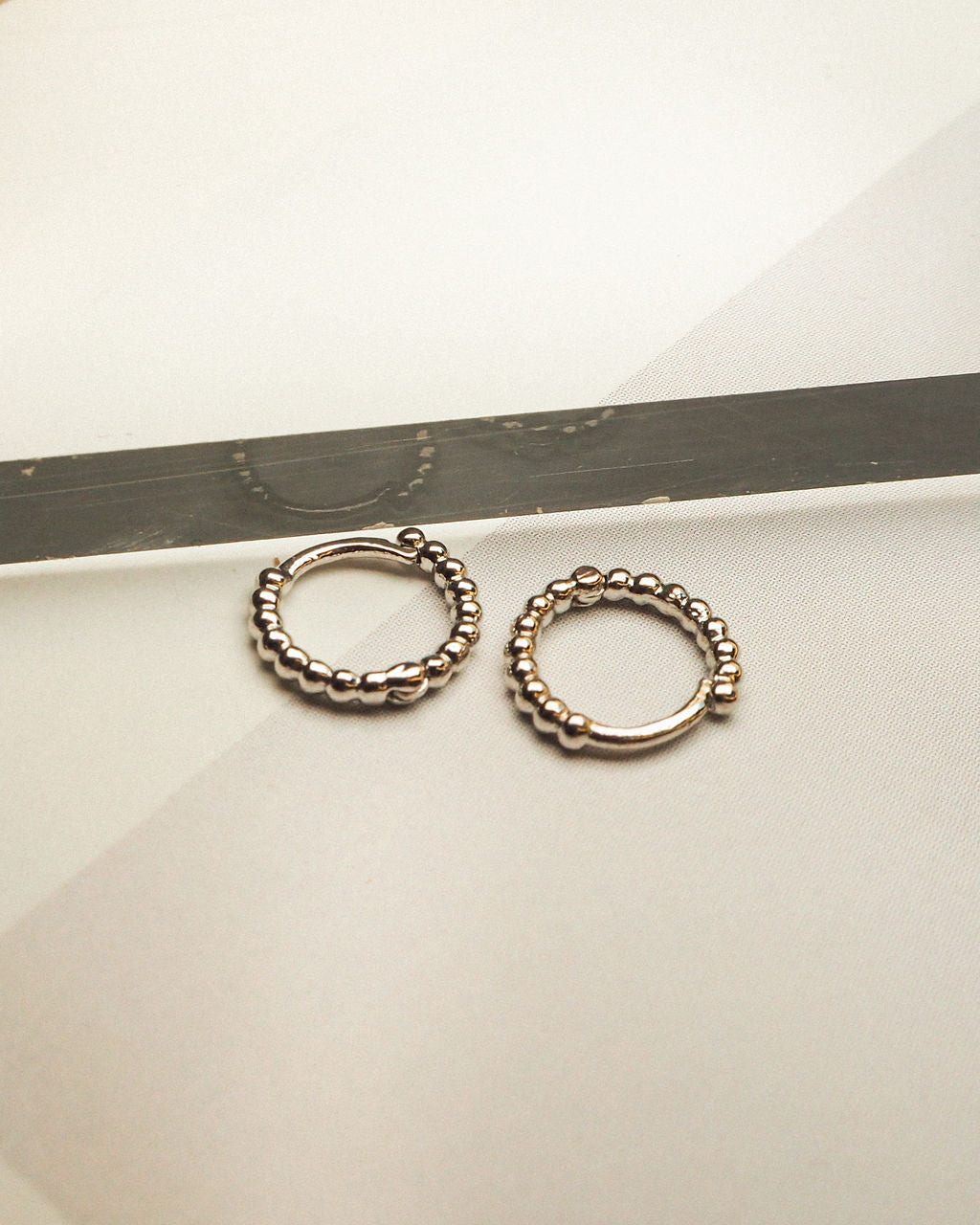 Mini Continuous Beaded Huggies - Silver - Earrings — alternate angle