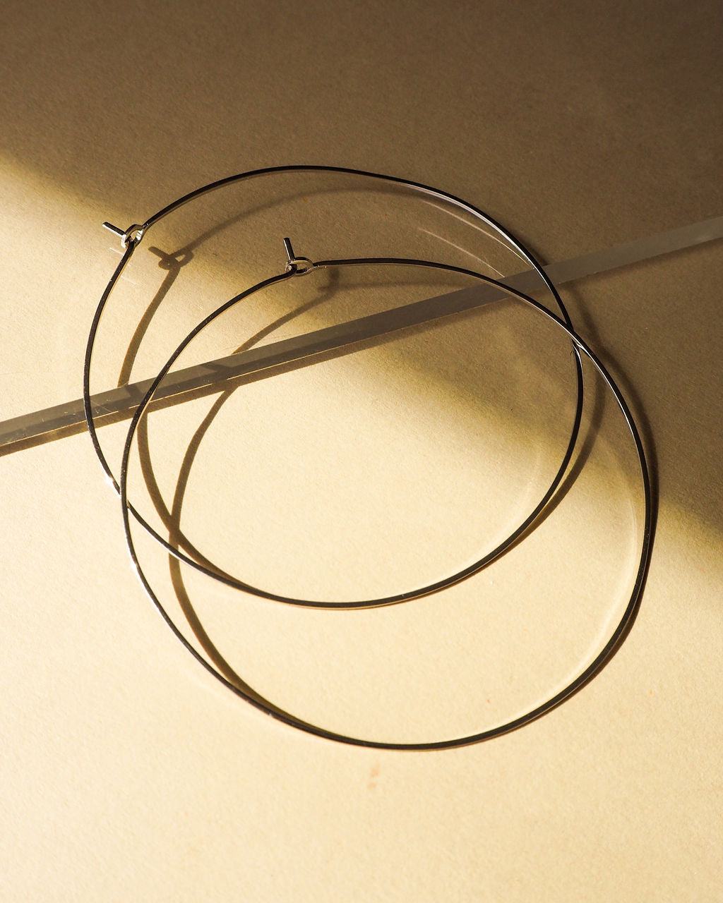 Capri Wire Hoops - Silver — detail view