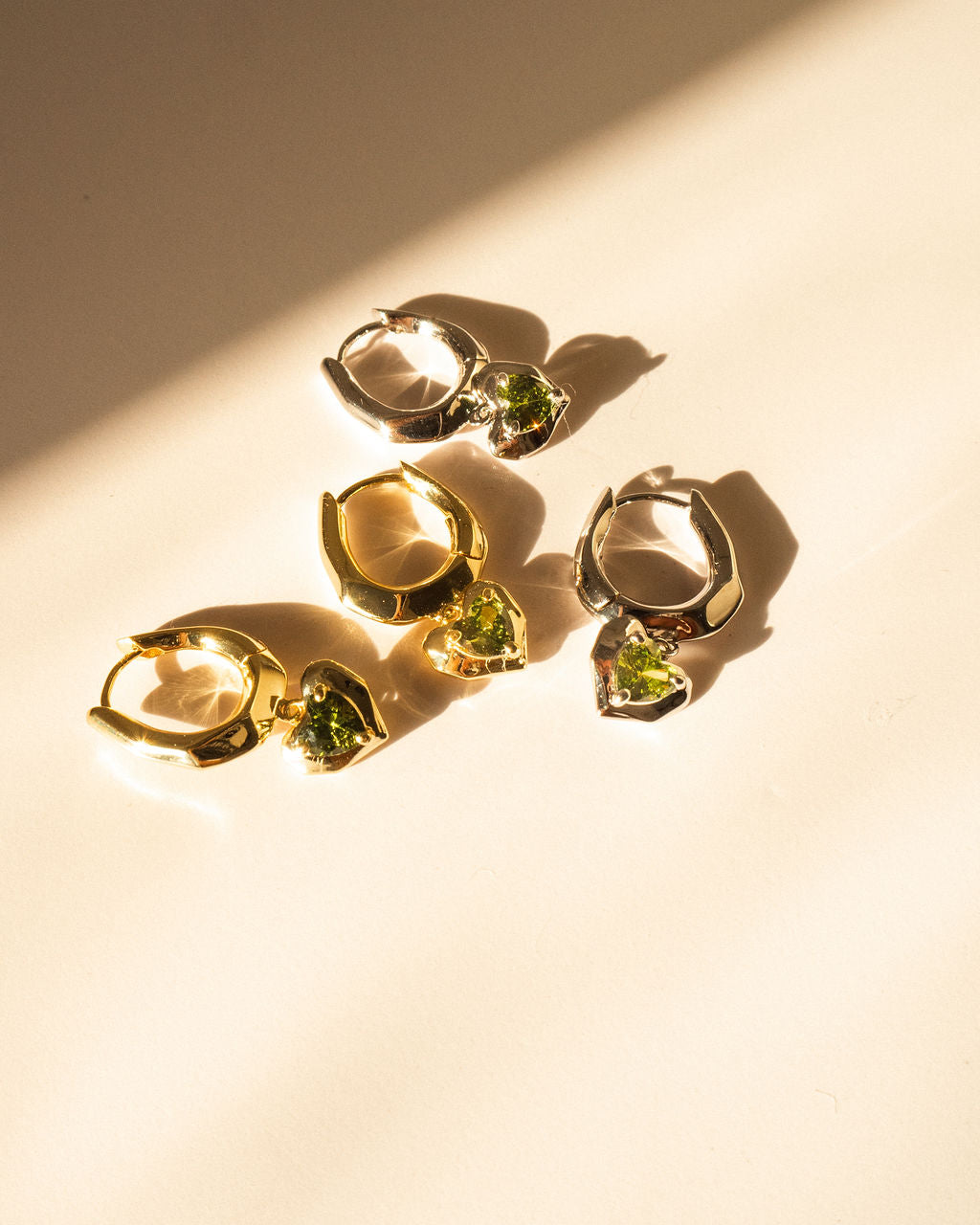 Molten Heart Huggies - Earrings — alternate angle