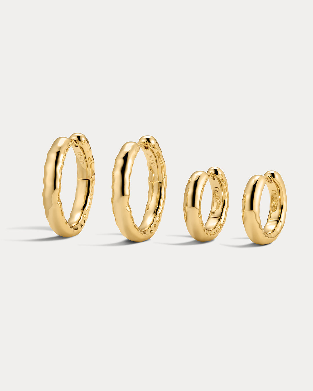 Liquid Metal Hoops Set in Gold