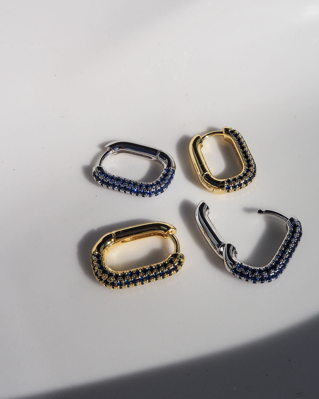Pavé Chain Link Huggies - Blue Sapphire - Silver — detail view