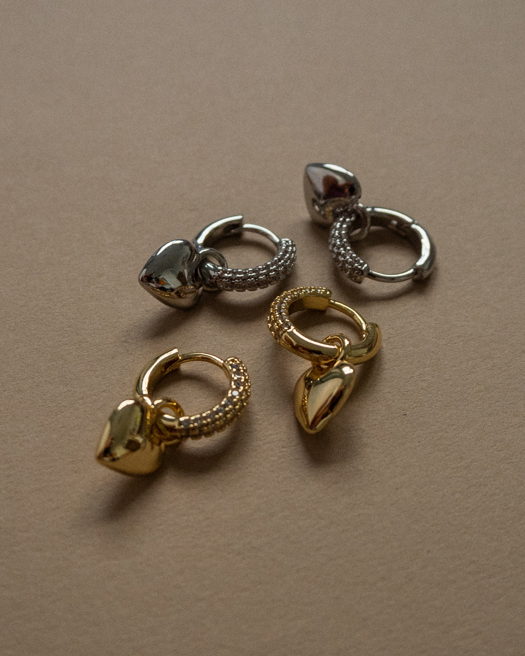 Puffy Heart Huggies - Silver - Earrings — another angle