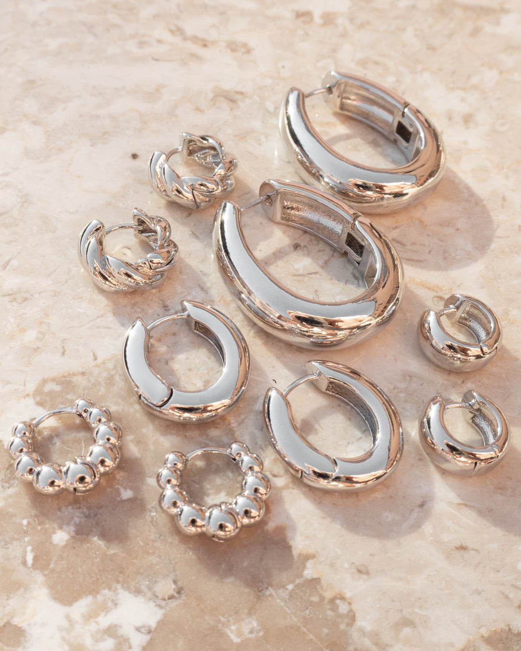 Carmella Huggies (20mm) - Silver - Earrings — alternate angle