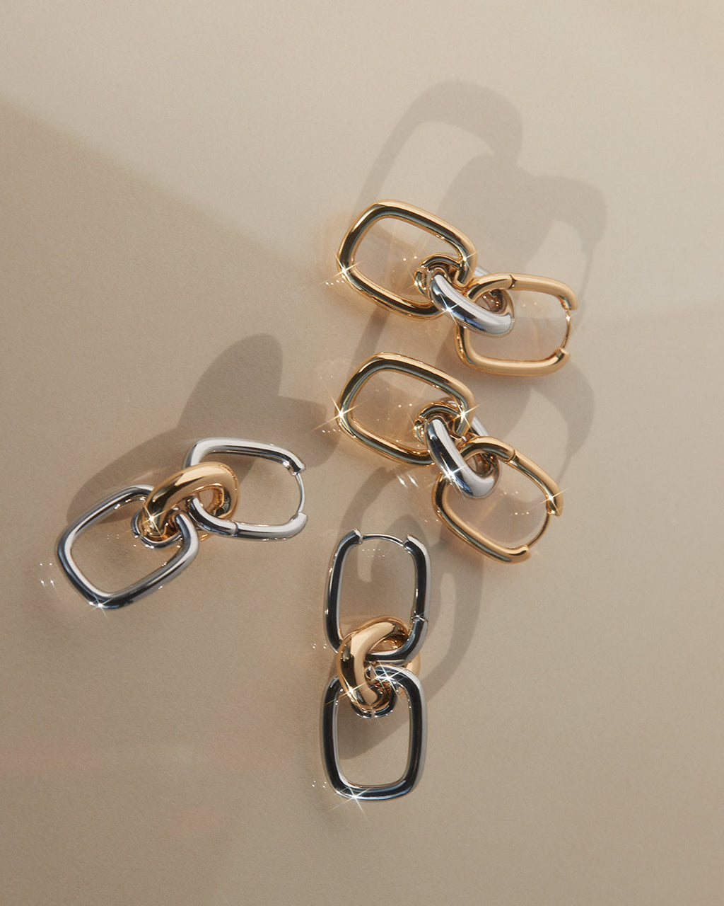 Two-Tone Chain Link Huggies — detail view