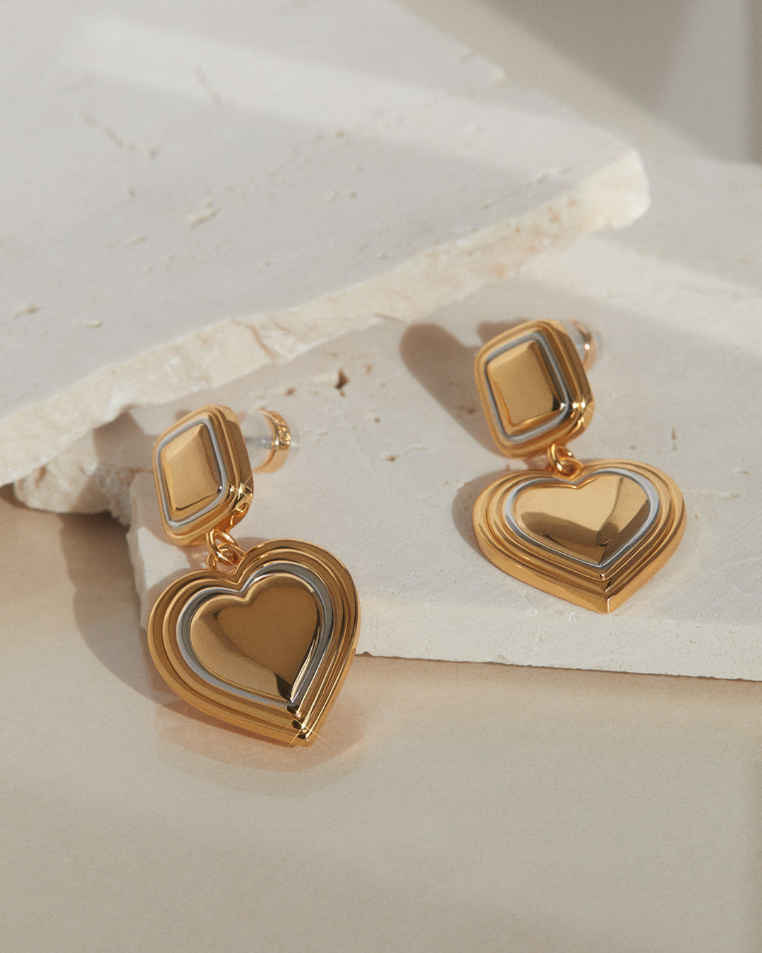 Two-Tone Heart Earrings — detail view