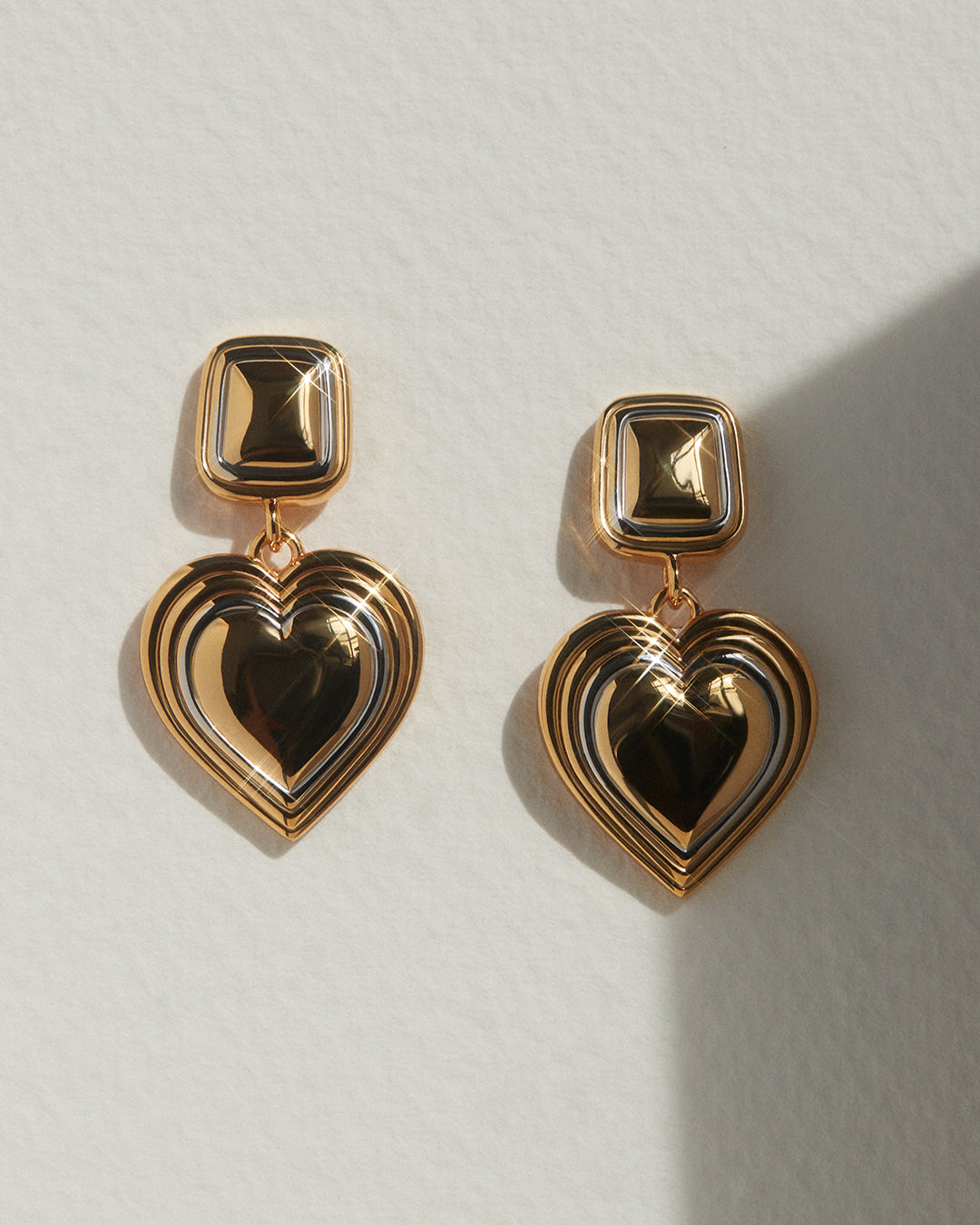 Two-Tone Heart Earrings — another angle