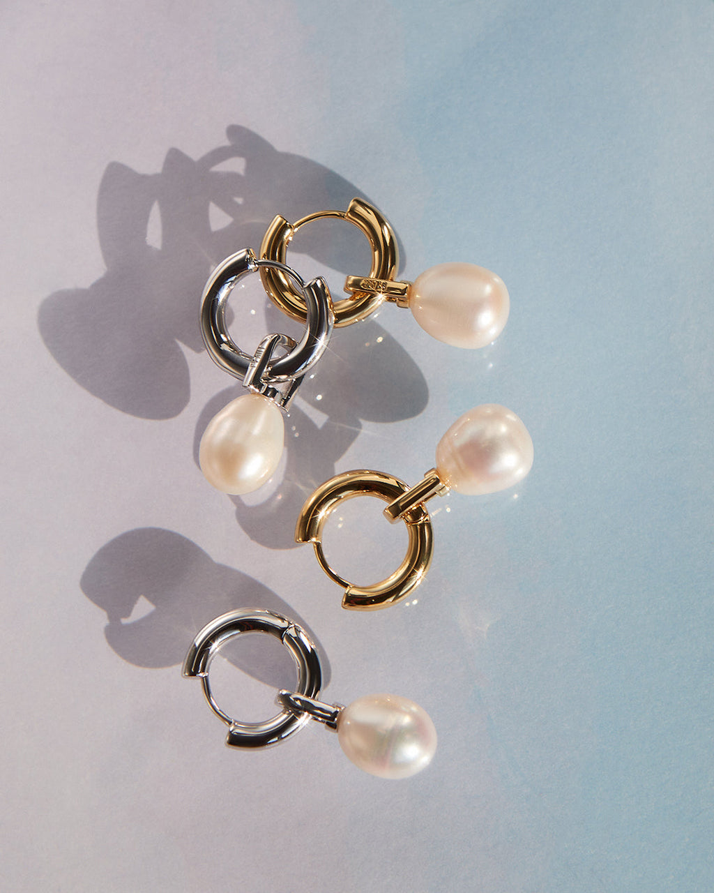 White Pearl Amalfi Huggies in White Gold - Earrings — another angle