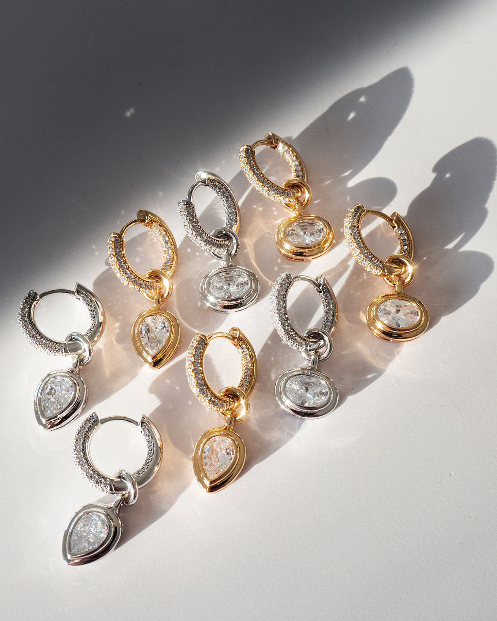 Pear Double Bezel Charm Huggies — detail view