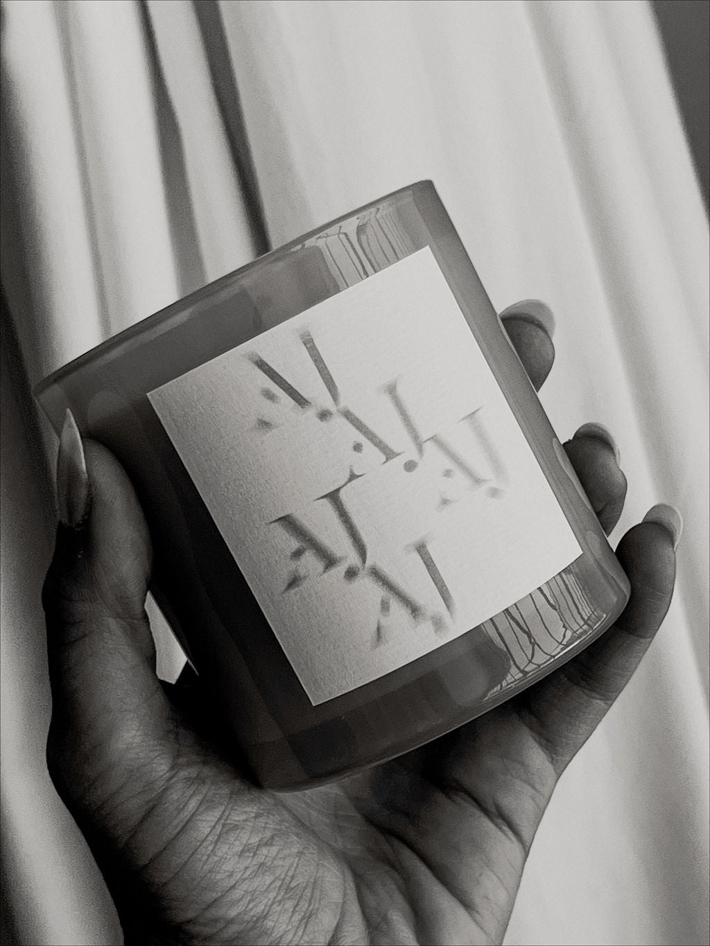The Luv Aj Candle — detail view
